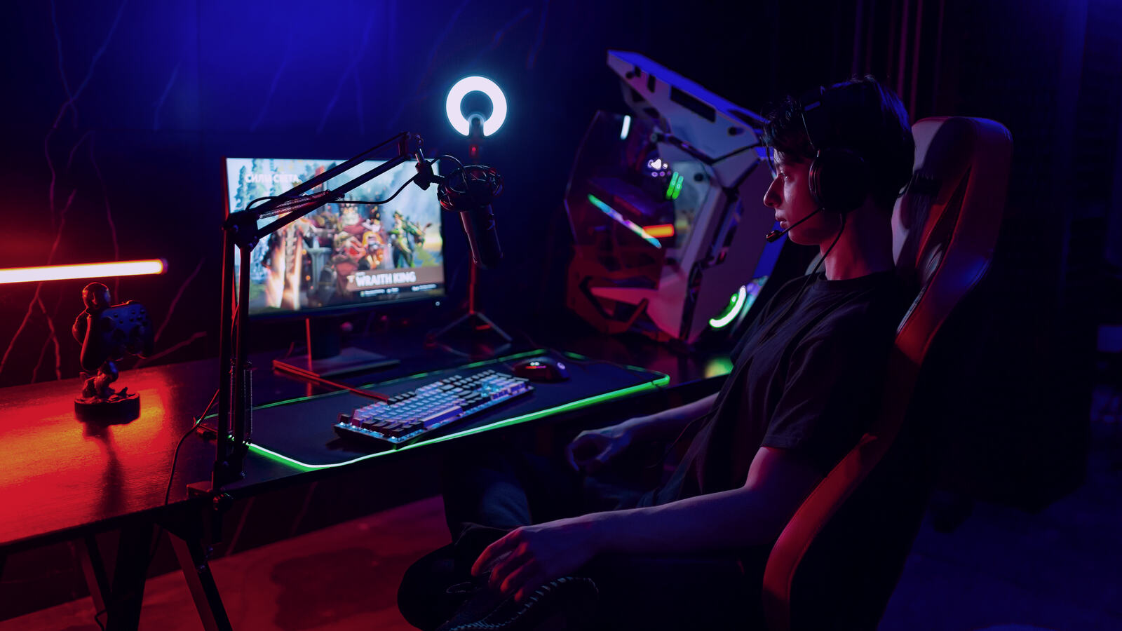 A player at a LORGAR setup mid-game