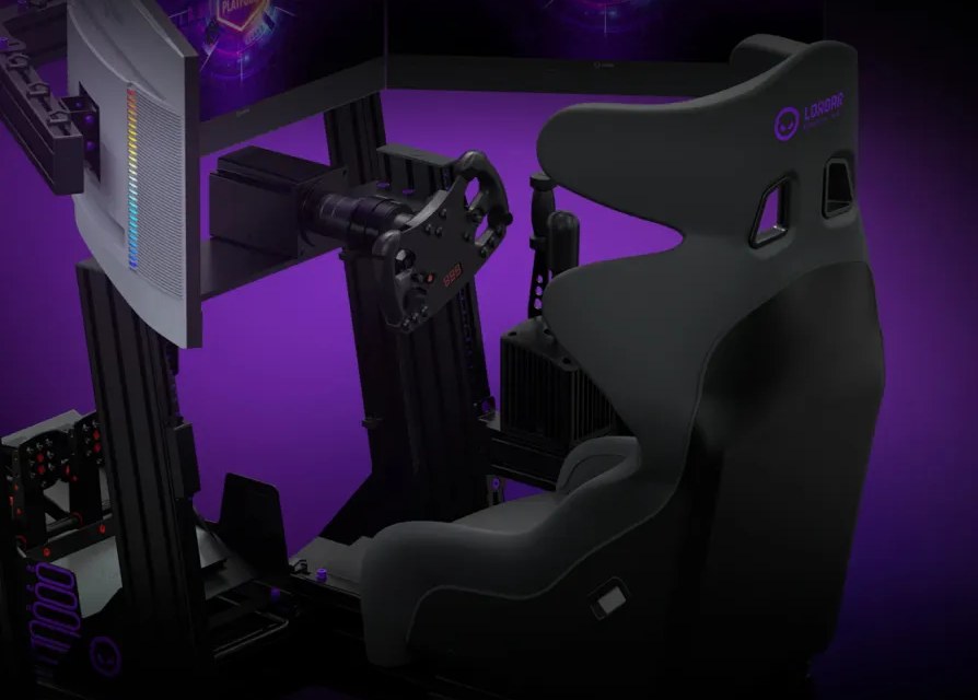 Close-up of the LORGAR Sim Racing Pro cockpit: wheel on a heavy base, shifter and handbrake beside the bucket seat