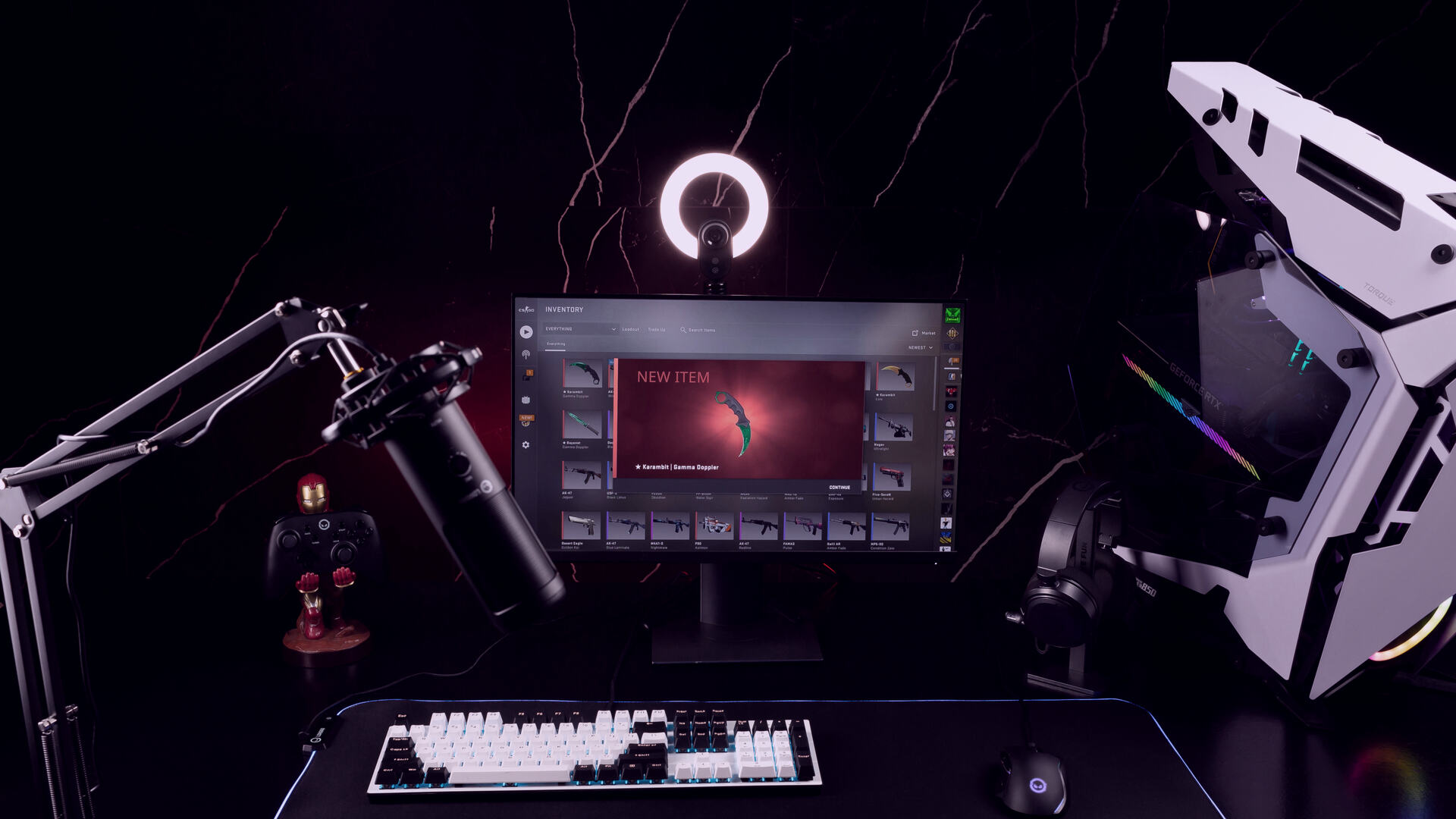 LORGAR streaming setup — boom-arm microphone, ring light, keyboard and monitor